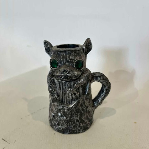 Vintage animal figure candle holder with green eyes, resin