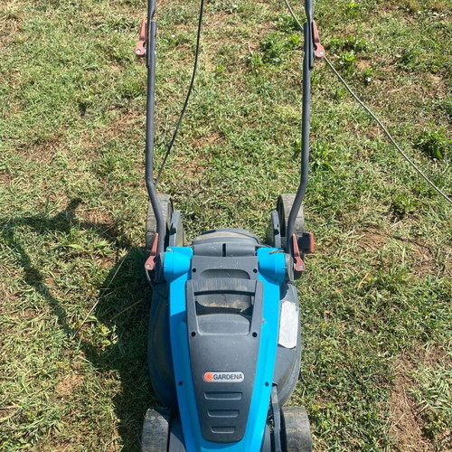 Electric lawn mower like new, easy to use