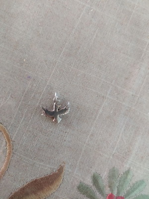 Silver pendant used, dove symbol of peace or Holy Spirit