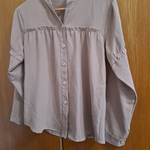 Women's beige shirt with ruffle details, new