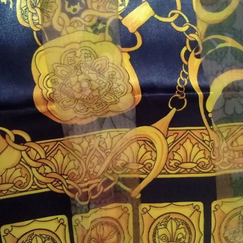 Women's semi-transparent scarf like new, blue with gold designs
