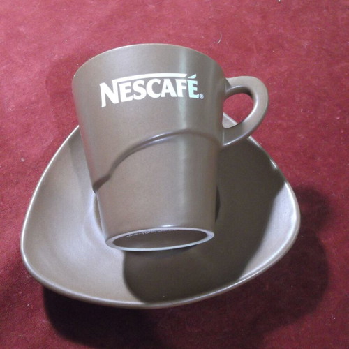 Nescafe collectible ceramic cup and saucer set like new
