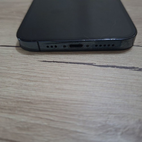 iPhone 12 Pro smartphone with 80% battery health, case included