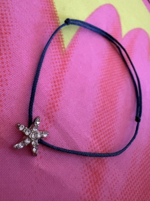 Blue cord bracelet with starfish and sparkling stones