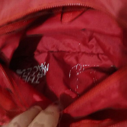 Northface red backpack used, waterproof with 4 compartments