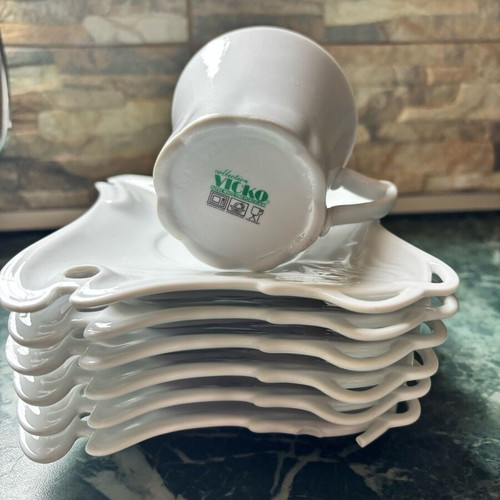 Cups small 6 and large 6 with saucers like new