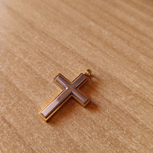 Jewelry cross silver with gold plating like new, stainless steel