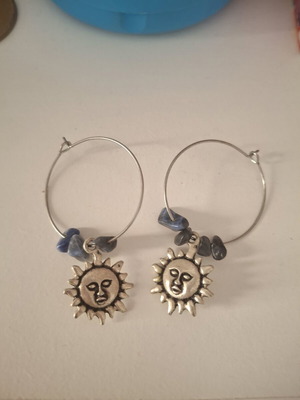 Sun hoop earrings with purple stones