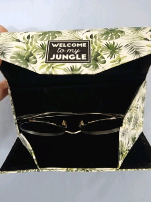 Folding glasses case used, white and green