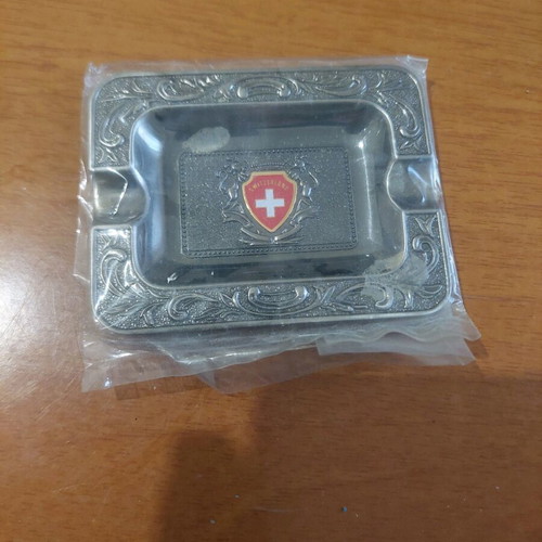 Collectible metal ashtray new with Switzerland emblem