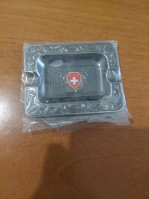 Collectible metal ashtray new with Switzerland emblem
