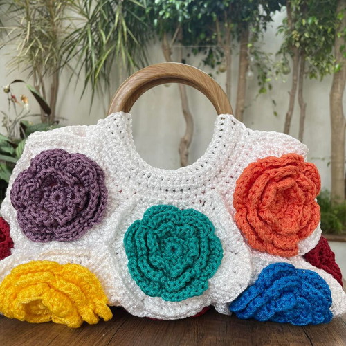 Handmade crocheted handbag with wooden handles and colorful flowers new