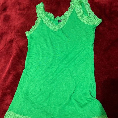 Women's set of 2 pieces used, black BSB skirt and green Voyelles lace top
