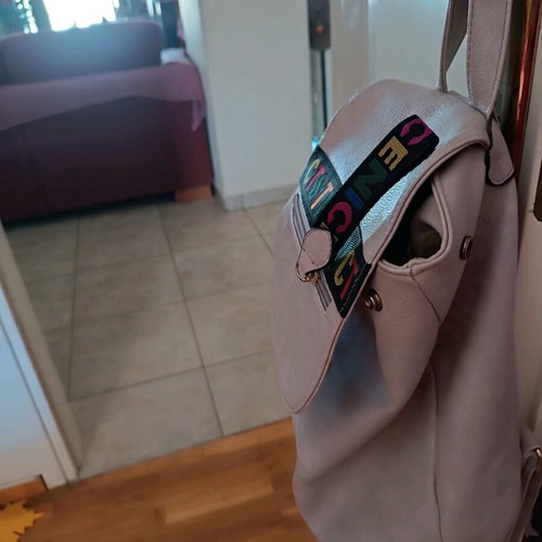 Backpack like new, light gray color