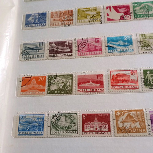 Two stamp albums with stamps from around the world
