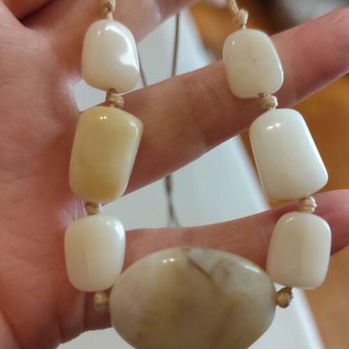 Summer necklace used with beige beads and cord