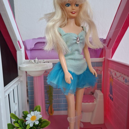 Doll like new with dress wear