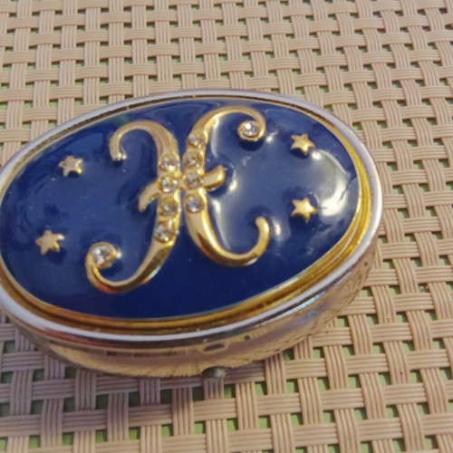 Vintage metal pill box with enamel and monogram X, like new