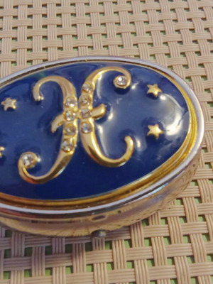 Vintage metal pill box with enamel and monogram X, like new