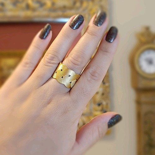 Steel braid ring new in matte gold color adjustable