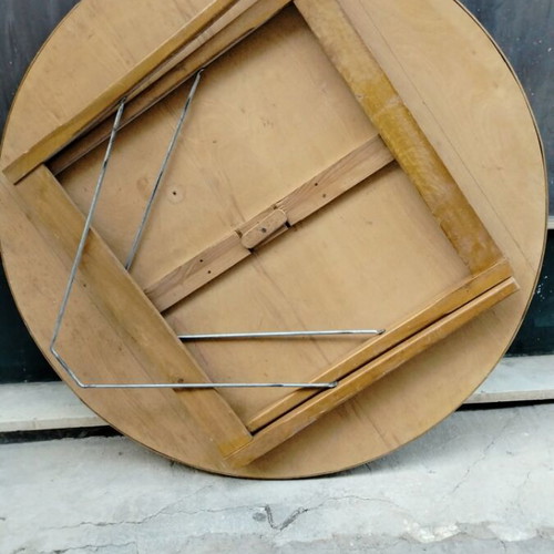 Round table used with green felt and folding beech legs