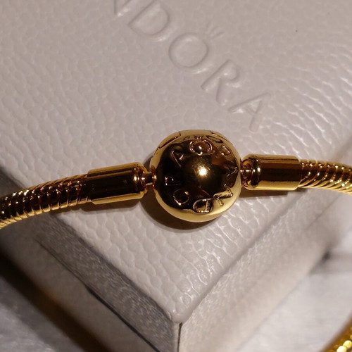 Pandora bracelet size 18 cm, gold plated with round clasp