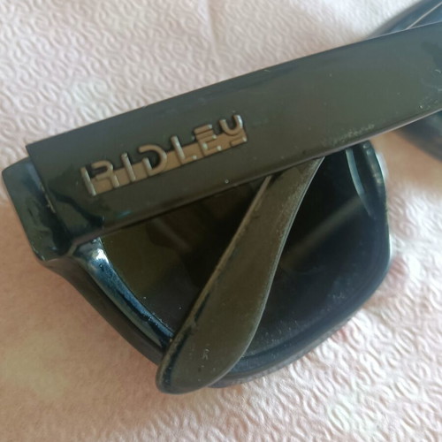 Ridley men's sunglasses with green lenses, broken frame