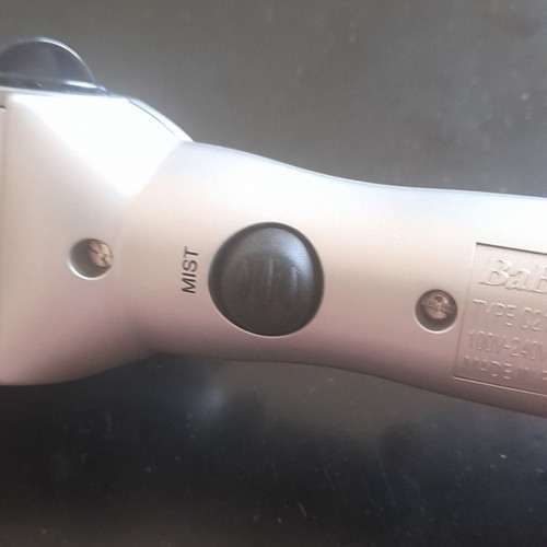 Babyliss hair straightener with three plates used and steam