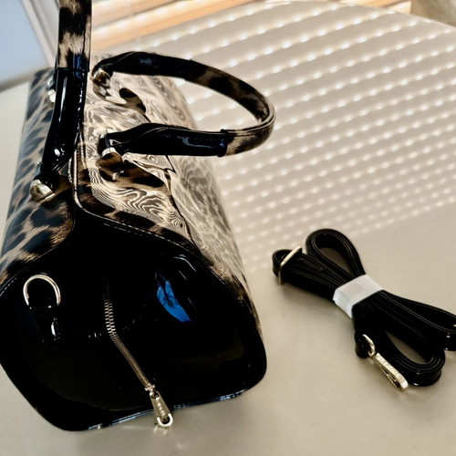 Tom & Eva Leopard Pri handbag like new, glossy synthetic