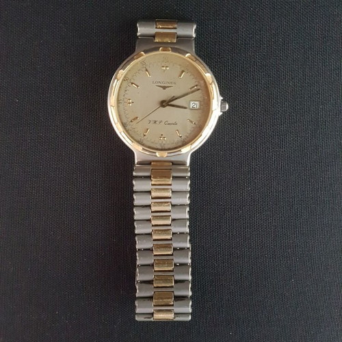 Longines Conquest V.H.P quartz used, gold and silver