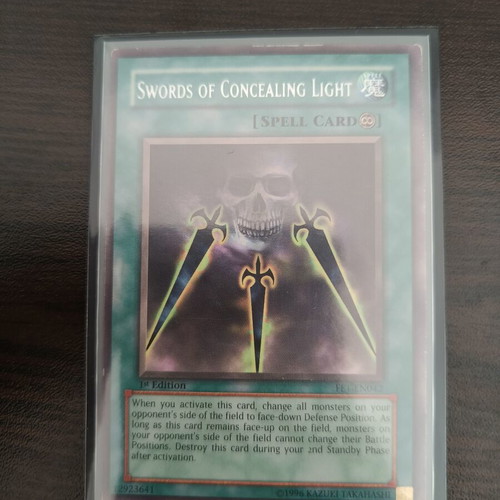 Yu-Gi-Oh Swords of Concealing Light card rare used