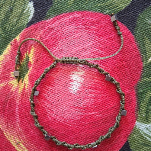 Macrame bracelet with hematite beads, like new, adjustable size