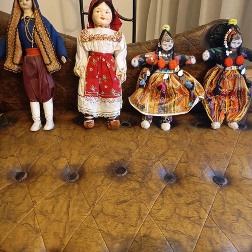 Handmade vintage dolls with traditional costumes like new, set of 4