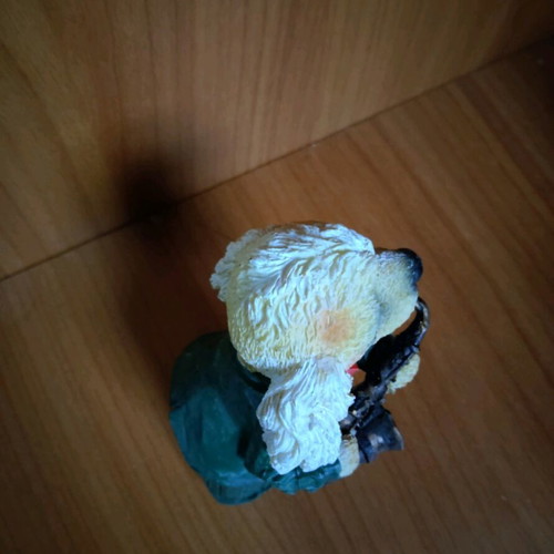 Decorative dog figure with saxophone like new