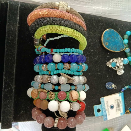 Set of 20 colorful jewelry pieces: 14 bracelets, 2 necklaces, 2 rings, 1 earring, 1 pendant