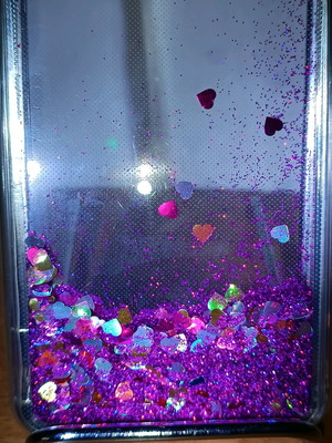 iPhone silicone case with liquid glitter used