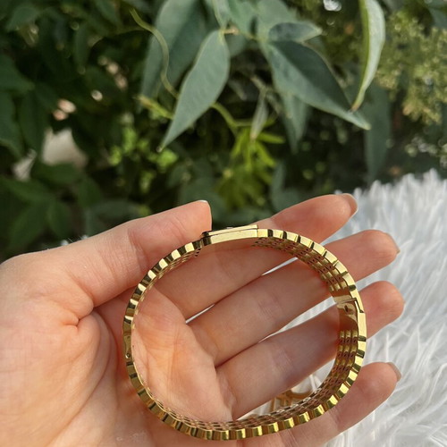 Princess stainless steel bracelet and earrings set like new, black and gold