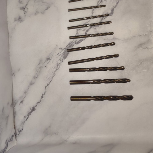 Drill bit set like new, 15 pieces of various sizes