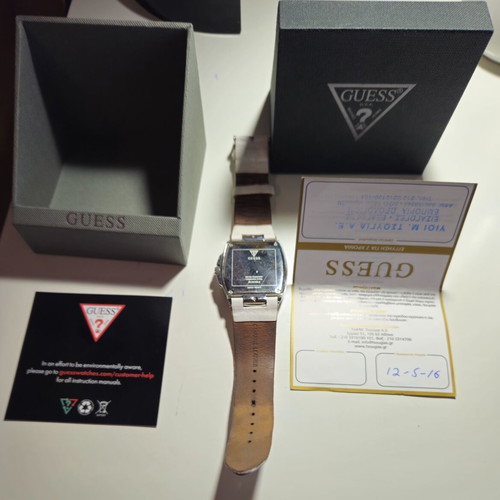 Guess women's watch used with box and purchase receipt