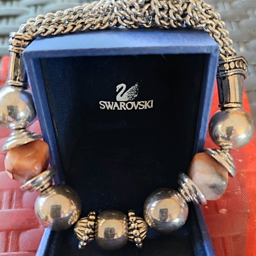 Silver-plated bracelet like new with genuine brown stones and elastic