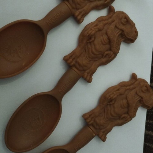 Nestle collectible spoons with Tyrannosaurus Rex, like new, set of 3
