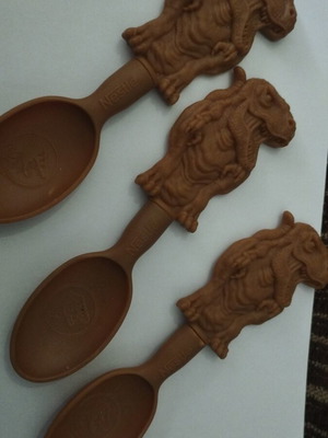 Nestle collectible spoons with Tyrannosaurus Rex, like new, set of 3