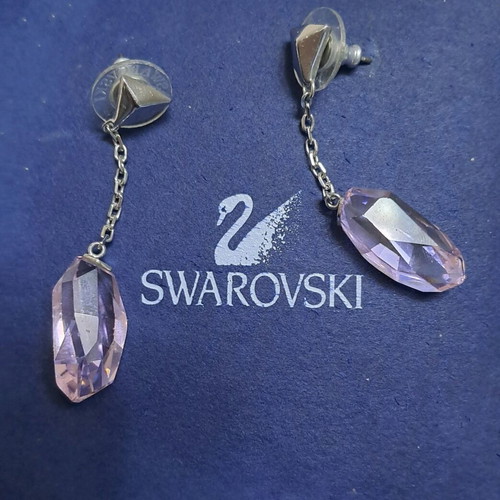 Swarovski earrings dangle with pink stone like new