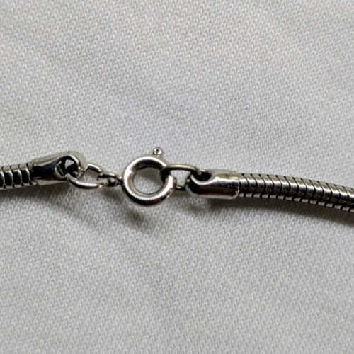 Steel choker necklace in like new condition, silver color