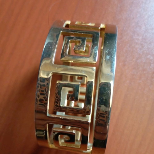 Bracelet like new, unknown material, gold color