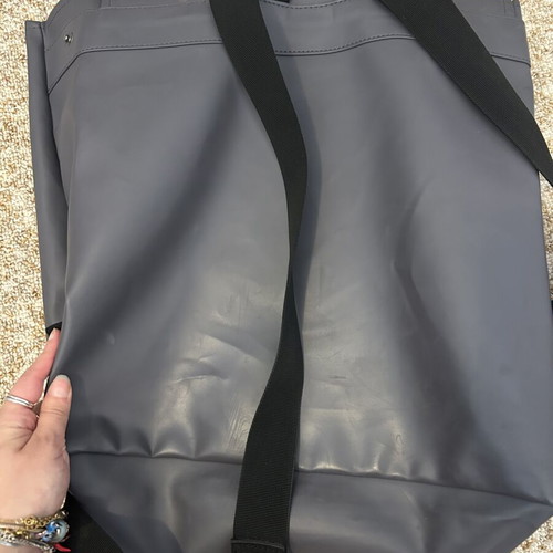 Rains backpack men's used with front wear, gray