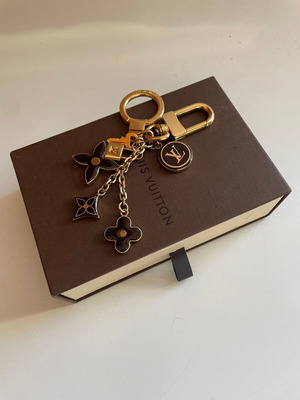 Louis Vuitton μπρελόκ bag charm ring Fleur de Monogram σαν καινούργιο, χρυσαφί