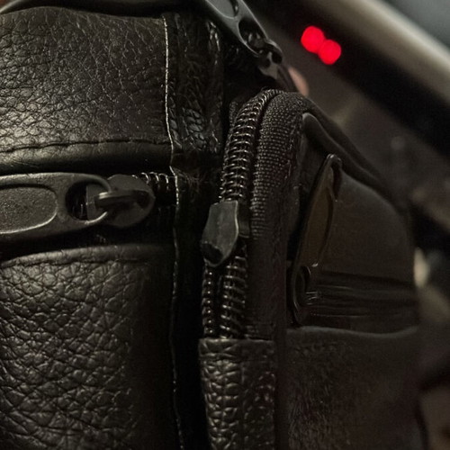 Black waist bag like new with minor zipper defect