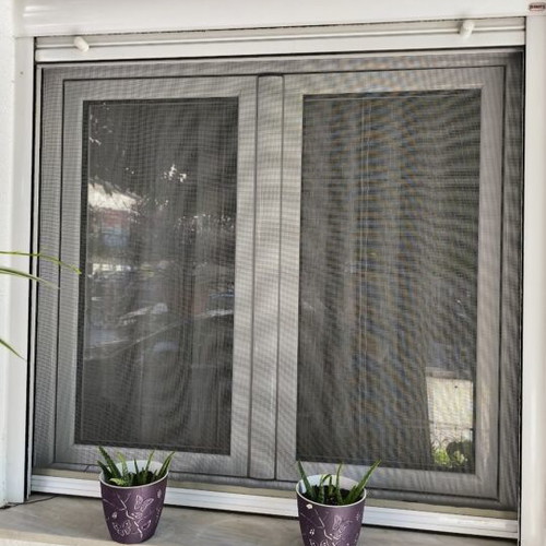 Aluminum frames used, two balcony doors and three windows with shutters and screens