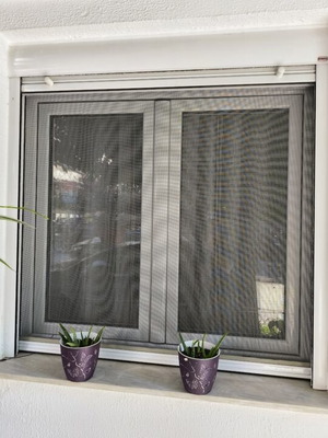 Aluminum frames used, two balcony doors and three windows with shutters and screens
